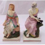 A pair of 19th century Staffordshire biblical figurines on raised square bases, 24cm (h)