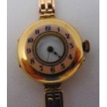 18ct yellow gold ladies wristwatch on an articulated bracelet, approx total weight 28.2g