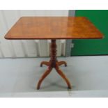 A rectangular early 20th century mahogany and walnut tilt top table on four outswept legs, 72 x 76 x