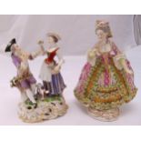 A continental porcelain figurine of a lady in a crinoline dress on raised circular base and