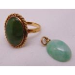 9ct gold and jadeite ring and a jadeite pendant