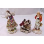 Three porcelain figural groups to include a dancing girl, courting couple and a lady of the land,