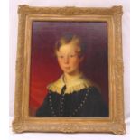 A framed oil on board portrait of a young boy, 50 x 40cm