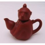 A Chinese miniature terracotta teapot, character mark to the base