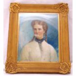 A framed oil on canvas portrait of a young lady with pigtails indistinctly signed bottom left, 52