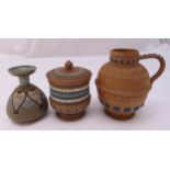 A Doulton Silicon ware flagon, a Doulton Silicon tobacco jar and cover and a Doulton Silicon vase,