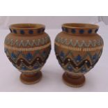 A pair of Doulton Silicon ware vase with applied blue and white geometric decoration, marks to the