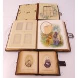 Three Victorian leather bound photograph albums, with some original photos