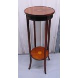An Edwardian circular mahogany inlaid plant stand on four outswept legs, 100 x 35cm