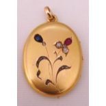Gold locket set with coloured stones, gold tested 14ct, approx total weight 22.8g