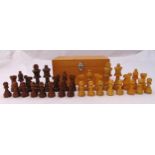 A wooden Chess set in fitted wooden case