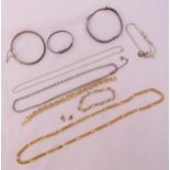 A quantity of silver and costume jewellery to include bracelets, necklaces and a pair of earrings