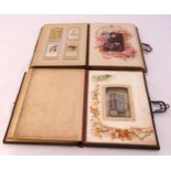 Two Victorian leather bound musical photograph albums with some original Victorian photographs,