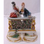 Capodimonte figural group of ladies by a balcony on raised shaped oval base, marks to the base, A/F,