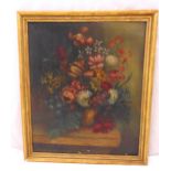 A framed oil on canvas still life of flowers in the style of Jan Van Os indistinctly signed