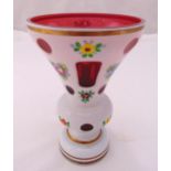 A Bohemian vase red ground overlaid with white glass decorated with stylised flowers, 21cm (h)