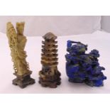 An oriental soapstone carving of a pagoda, a female figurine on raised plinth and a lapis lazuli