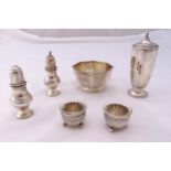 A quantity of hallmarked silver to include a sugar sifter, a sugar bowl and condiments, approx total