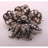 A Victorian diamond flower brooch set with old cut diamonds