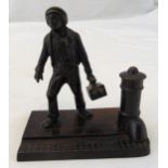 A bronze figurine of a shoeshine boy on rectangular base, 9.5cm (h)