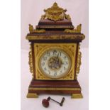 A 19th century mahogany and gilt metal bracket clock, the wooden case mounted with pierced
