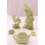 A quantity of carved jadeite to include a cockerel, a teapot and pill boxes (5)