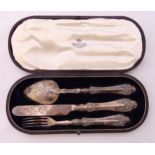 A cased Victorian hallmarked silver Christening set to include a knife, a fork and spoon, Birmingham