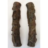 A pair of oriental bronze paper weights in the form of insects on bamboo shoots, 17.5cm (l)