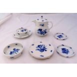 A quantity of Meissen blue and white porcelain to include a teapot and stand, a butter dish with