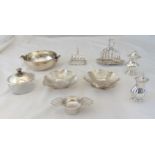 A quantity of silver plate to include toast racks, condiments and a caviar dish and bowl