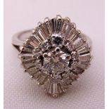 Platinum and diamond dress ring, central diamond approx 40 points, surrounded by ten three point