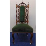 A late Victorian mahogany hall chair with upholstered seat and back, cabriole legs and original