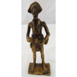 An early West African gilded metal figurine of a warrior on rectangular plinth, 17cm (h)