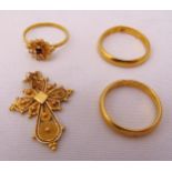 A quantity of gold jewellery to include a crucifix and three rings, tested 18ct, approx total weight