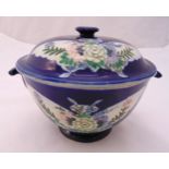 A Chinese bowl and cover decorated with leaves and flowers on raised circular base impressed wax