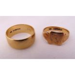 9ct yellow gold signet ring and a 9ct yellow gold wedding band, approx total weight 9.7g