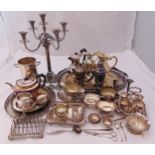 A quantity of silver plate to include trays, a candelabrum, a wine cooler, teapots, jugs and a toast