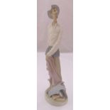 Lladro unglazed Don Quixote figurine on raised oval base, marks to the base, 29.5cm (h)