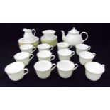 Wedgwood Gold Chelsea teaset for twelve place settings to include cups, saucers, plates, a milk jug,