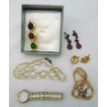 A quantity of costume jewellery to include earrings, necklaces, a wristwatch and a Christian Dior