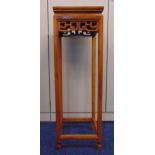 An oriental wooden rectangular plant stand with pierced carved gallery, 91 x 30 x 30cm