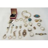 A quantity of silver and costume jewellery to include rings, earrings, a bangle and brooches