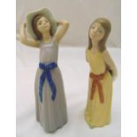 Lladro two figurines of girls with hats, marks to the bases, 26cm (h)