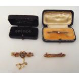 Four 9ct gold bar brooches to include a rope twist, a heart design set with opals, one set with