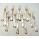 A set of twelve George IV Scottish hallmarked silver single struck Kings pattern table forks,