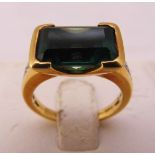 18ct yellow gold ring set with a green stone, approx total weight 5.2g