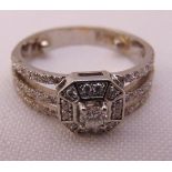 A white gold and diamond dress ring, tested 14ct, approx total weight 4.5g