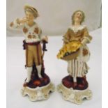 A pair of continental ceramic figurines of a girl carrying flowers and a boy with a hat, mounted