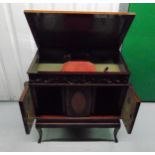 An early 20th century rectangular gramophone in fitted mahogany case on four cabriole legs, 88 x