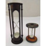 Two vintage hour glass sand timers of customary form, tallest 22cm (h)